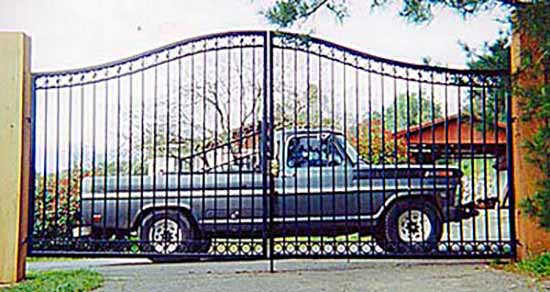 DiFranco Gate & Fence Company - Custom Ornamental Iron Driveway Gates - Double Arched - Driveway Gate with Circle Design - Penngrove, CA